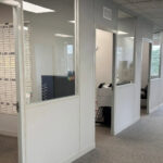 ProPart System 40™ modular offices with interior windows and doors in an administrative workspace